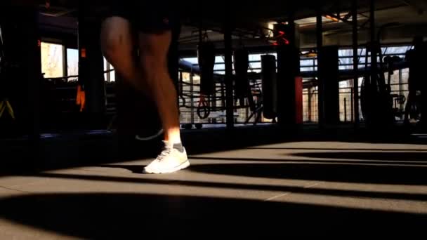 Men Legs Treadmill Man Jumps Rope Fast Leg Movements Simulator — Stock Video