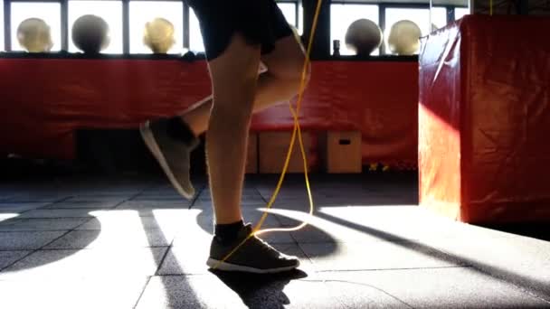 Men Legs Treadmill Man Jumps Rope Fast Leg Movements Simulator — Stock Video