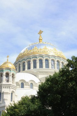 Church dome of golden color with a cross. Christian faith. religious building