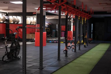 February 19, 2023 Ukraine, Dnipro. Boxing ring in the gym. Place for martial arts. Punching bags. Training on tatami and boxing mats, canvas for wrestling and sparring