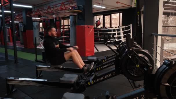 February 2023 Ukraine Dnipro Rowing Machine Firm Concept Man Workout — ストック動画