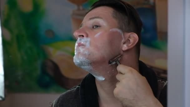 Man Shaves Old Style Razor Replaceable Blade Foam Shaving Brush — Stock Video
