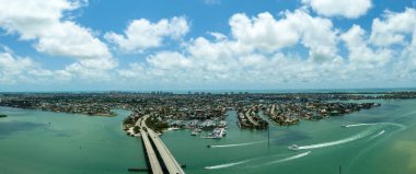 Bridge headed into Marco Island along the Gulf of Mexico in Southwest Florida clipart