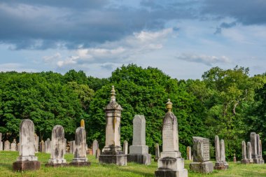 Historic Gravestones, St. Jacobs Stone Church Cemetery, Glenville PA USA clipart