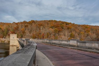 The Road on Top of Prettyboy Dam on an Autumn Evening, Maryland USA clipart