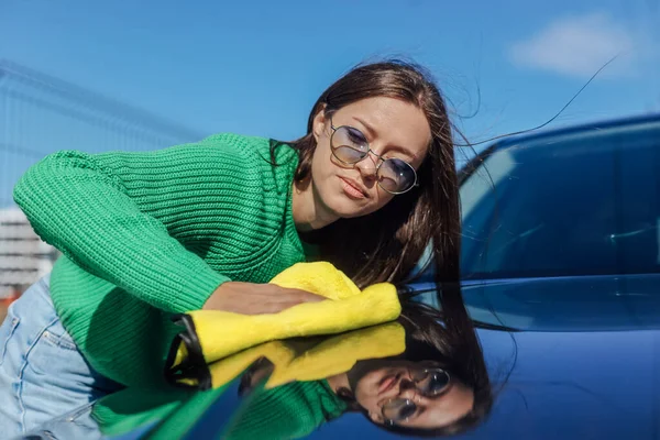 stock image Washing and cleanig car in a self-service car wash station.