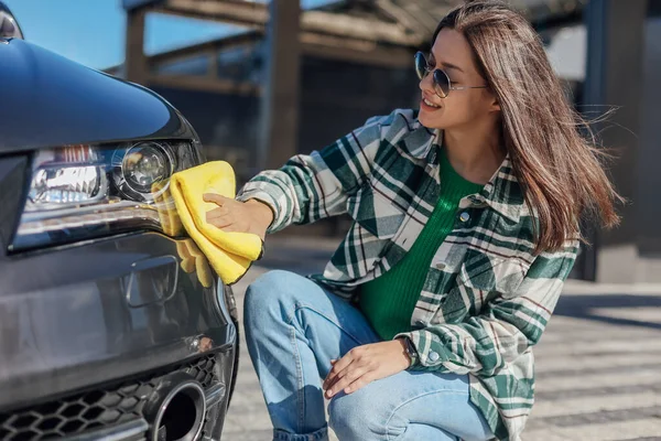 stock image Washing and cleanig car in a self-service car wash station.