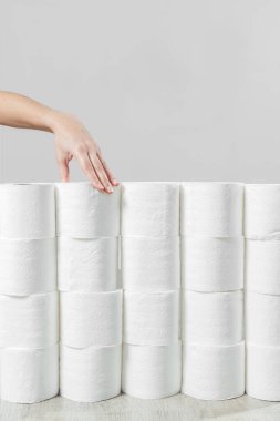 Young woman with toilet paper on white backgound
