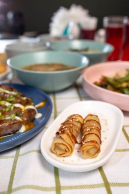 a dining table with different food served in a cafe or restaurant.