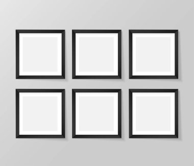 Duvarda altı siyah çerçeveli şablonlar var. Kare çerçeveli vektör modellemesi.