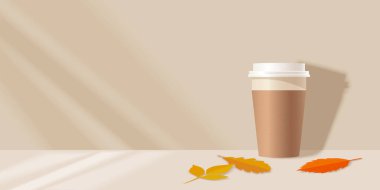 Kağıt kahve fincanı şablonu ve bej arka planda sonbahar yaprakları.