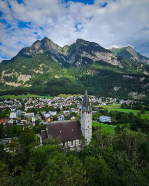 view of church and church on mountain background in Liechtenstein clipart