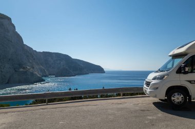 Lefkada island. Greece- 10.21.2022. A camper van, motor home with a stunning view of Porto Katsiki beach. clipart