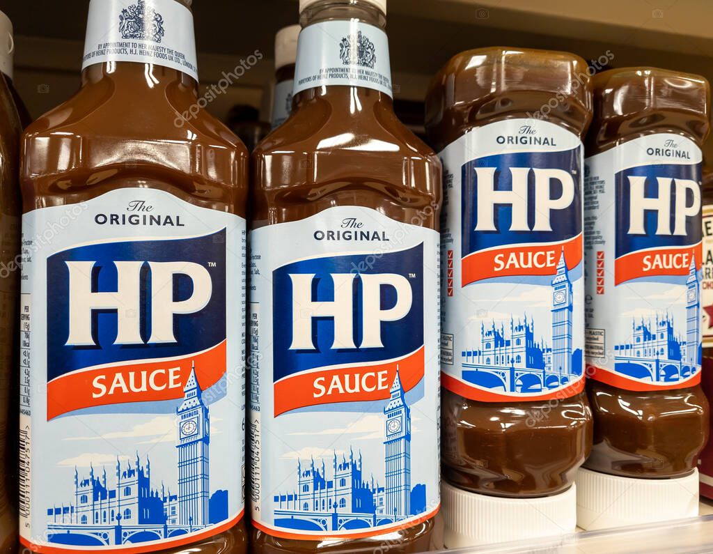 London. UK- 01.27.2023. Bottles of HP Sauce on display on the shelf of a grocery store.