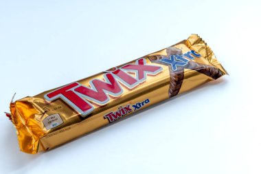 London. UK-02.12.2023. A packaged Twix chocolate bar isolated in white.