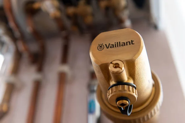 stock image London. UK- 04.07.2023. The Vaillant company name and trademark on a part of a combi boiler.