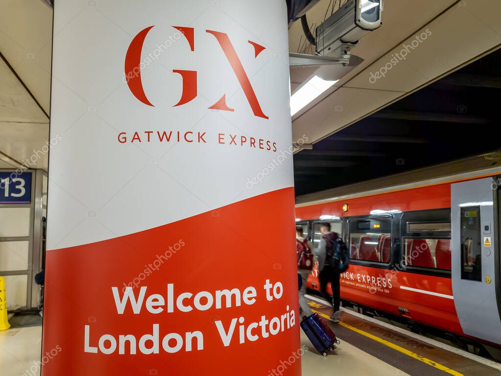 London Victoria.UK-05.13.2023.The signs and train of the Gatwick Express train service at London Victoria railway station.