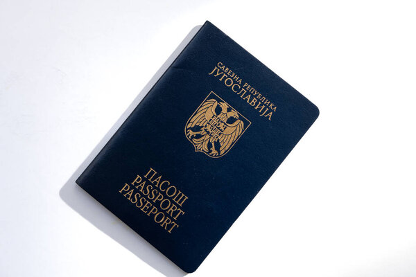 A Serbian passport isolated in white.