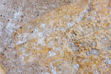 Doğal bir taşın üzerindeki renkler, dokular ve desenler. Taş arkaplan.