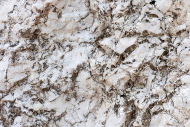 Doğal bir taşın üzerindeki renkler, dokular ve desenler. Taş arkaplan.