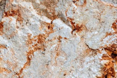 Doğal bir taşın üzerindeki renkler, dokular ve desenler. Taş arkaplan.