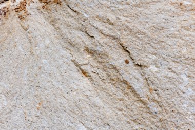 Doğal bir taşın üzerindeki renkler, dokular ve desenler. Taş arkaplan.