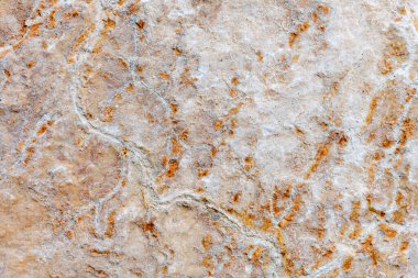 Doğal bir taşın üzerindeki renkler, dokular ve desenler. Taş arkaplan.