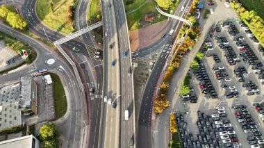 London. UK- September 28. 2025. A morning drone view of the North Circular Road Staples Corner Flyover with the network of roundabouts and junctions beneath.