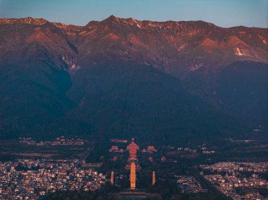 Dali Old Town and Three Pagodas at sunset.