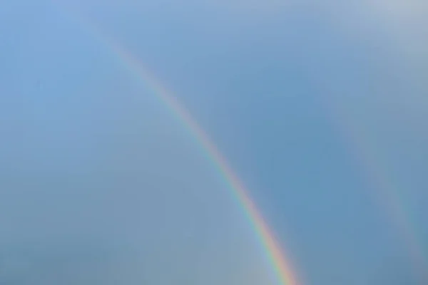 Double Rainbow on Blue Sky after Rain