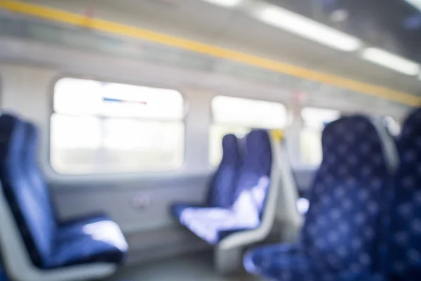 stock image Blurred image bokeh of seating inside the train in UK.