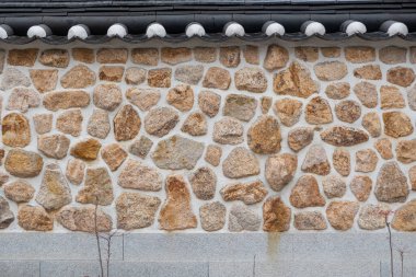 Kore 'nin geleneksel taş duvar sınırı Eunpyeong Hanok Köyü, Seul, Güney Kore