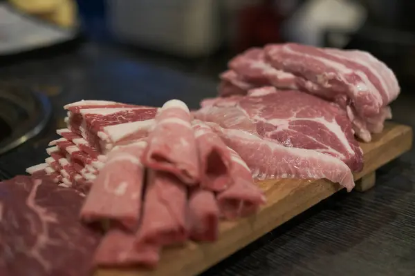 stock image Rare beef and pork, prepared for Korean Style Barbecue