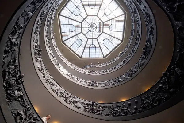 stock image Vatican City, 17 May 2017 : View of People walking along the Spiral Staircase in Vatican Museum