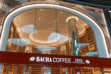 Singapore - 10 March 2024: Bacha coffee shop in Changi Airport. It was founded in Marrakech in 1910, with various types of Arabica coffee beans from different countries clipart