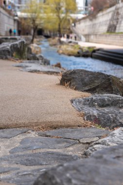 Cheonggyecheon stream, a modern public space in Seoul, South Korea, in beginning of spring. It transformed street to be environmentally sustainable and pedestrian oriented public space. clipart