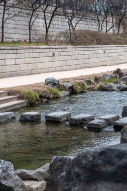 Cheonggyecheon stream, a modern public space in Seoul, South Korea, in beginning of spring. It transformed street to be environmentally sustainable and pedestrian oriented public space. clipart