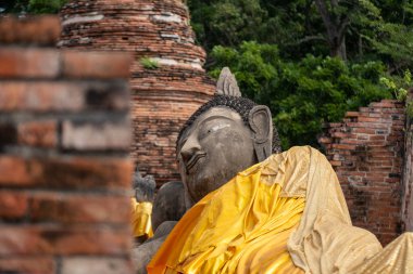 Reclining Buddha Image at Wat Phutthaisawan, an historic Thai Buddhist temple in Phra Nakhon Si Ayutthaya Province, Thailand. It is a part of Ayutthaya Historical Park clipart