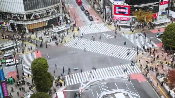 2022年11月28日 交通渋滞の時間的経過 群衆は渋谷スクランブル交差点を歩く 観光ランドマーク 日本の観光 アジアの交通機関やアジアの都市生活の概念 — ストック動画
