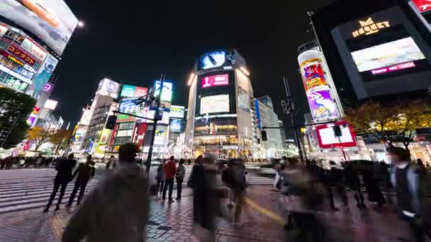 2022年11月28日 交通渋滞の時間的経過 群集は夜に渋谷スクランブル交差点を歩く 観光ランドマーク 日本観光 アジア交通 アジア都市生活コンセプト — ストック動画