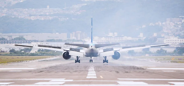 Large commercial airplane landing or take off on runway. Journey abroad tourism, oversea travel, flight transit, air travel transport, airline business, or transportation industry concept