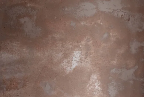 Beige gypsum plaster texture of wet wall as background