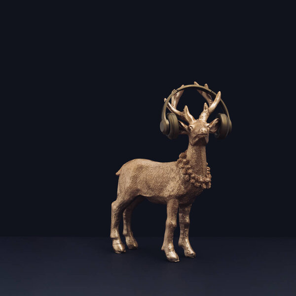 Golden reindeer with headphones on a black background. Trendy surreal composition for winter holidays, Christmas and New Year.