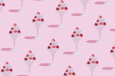 Seamless pattern of cocktail glass full of ice cubes with red hearts. Surreal love or fashion idea in a minimalist style.