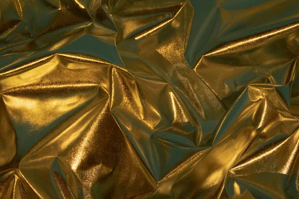 Abstract bronze color crumpled foil background. Minimal party concept.