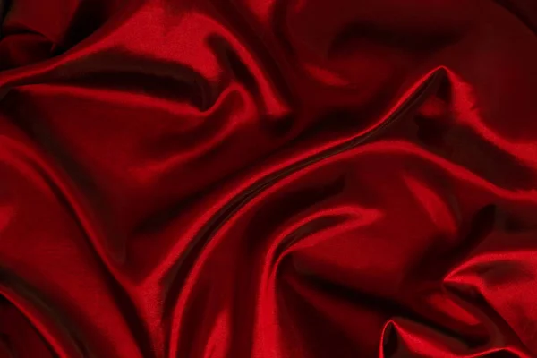 要旨濃い赤の背景 豪華な布や液体の波 グランジシルクのテクスチャサテンベルベット素材や豪華なクリスマスの背景の波状の折り目 エレガントな壁紙デザイン — ストック写真