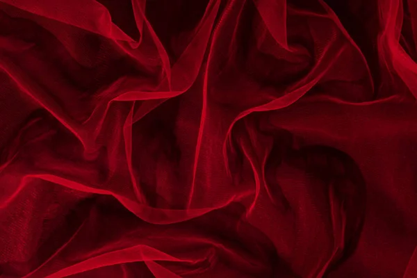 赤いチュール生地で作られた暗いエレガントな壁紙 審美的なファッション 情熱と愛の背景 — ストック写真