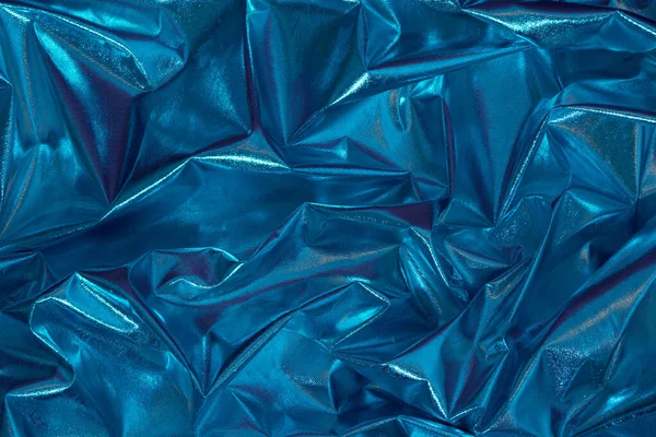 抽象的な青のしわのある箔の背景 最小限のパーティーコンセプト — ストック写真