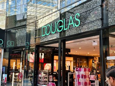 The Hague, netherlands - january 23 2023: store front and sign of a store of douglas perfumes and beauty products clipart