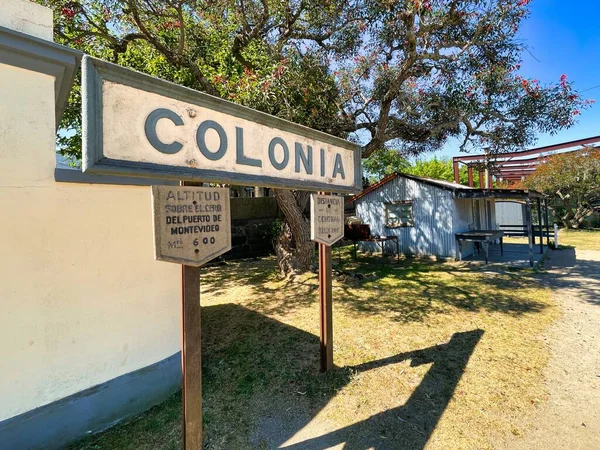 stock image colonia del sacramento, uruguay - november 2 2022: sign of the old classic architectural and abandoned railway station of the town